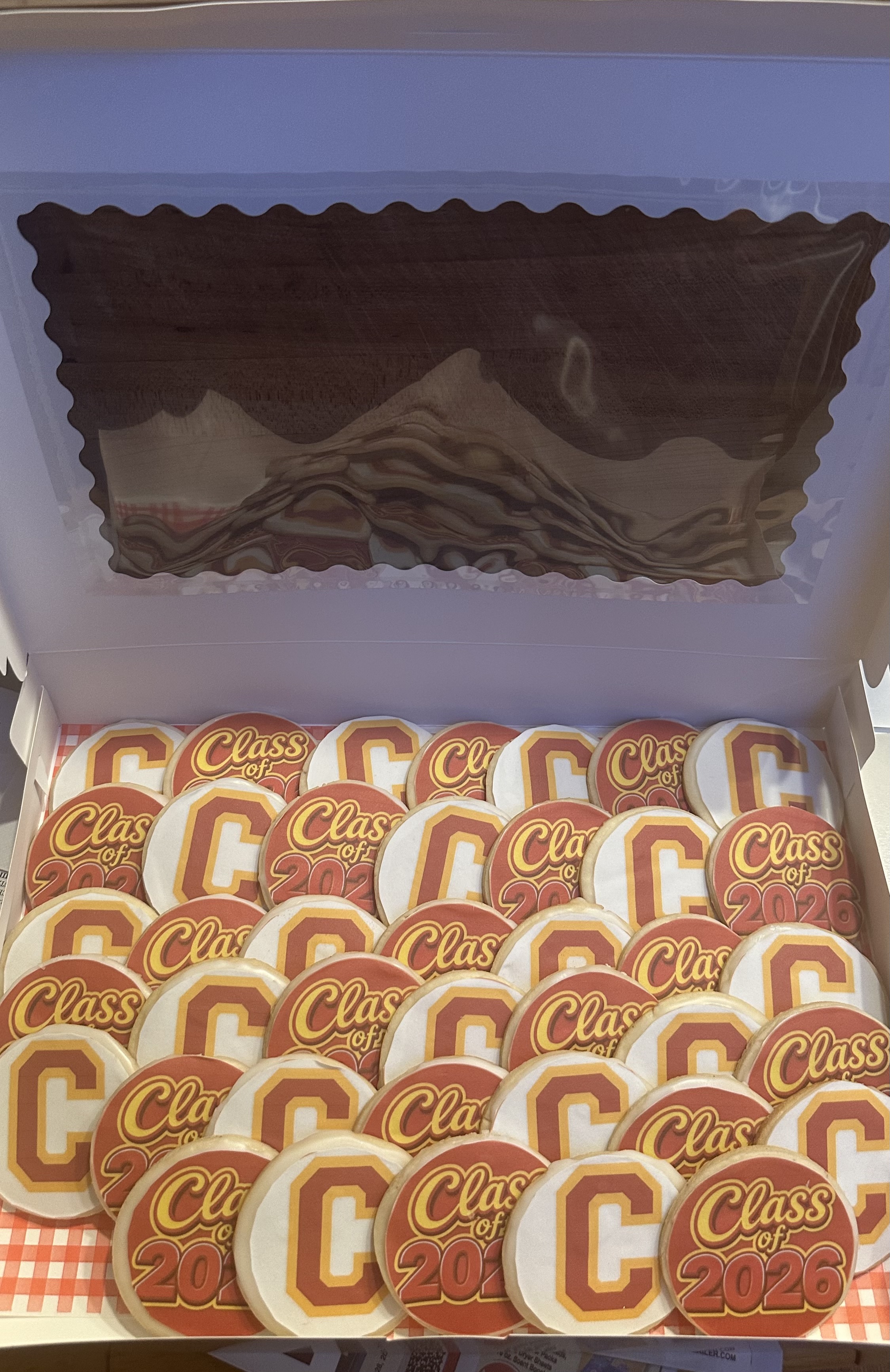 Boxed set of sugar cookies with edible school logo